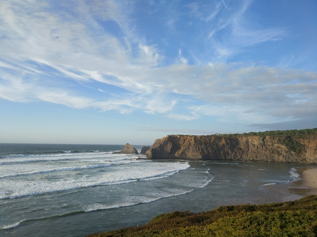 Traveling and living in car Portugal friends road trip coastline